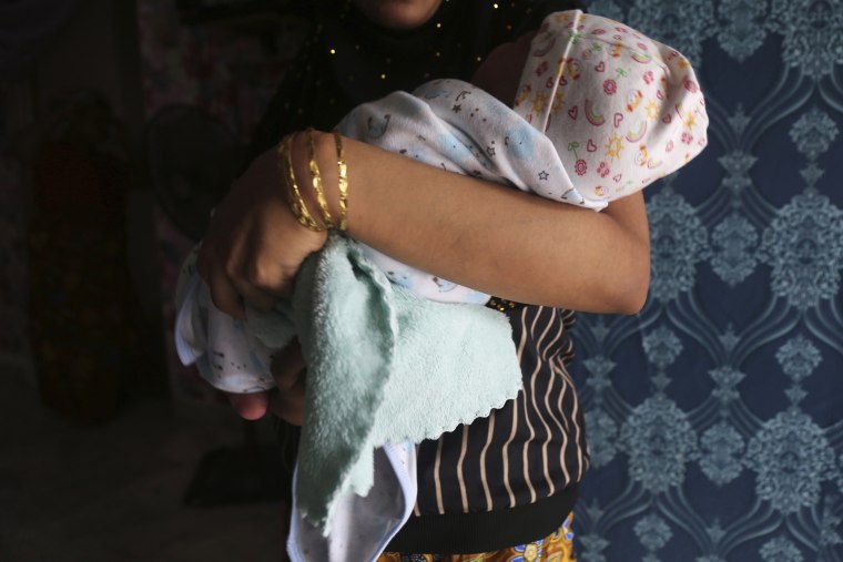 R left Bangladesh's refugee camps for Malaysia in 2022 to marry her 27-year-old husband as conditions in the camps deteriorated. R says she wasn't ready to have a baby, but felt lonely and is now glad to have the company.