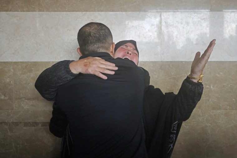 A woman cries for her dead at Nasser hospital in Khan Younis, Gaza, on Thursday, Dec. 14, 2023. 