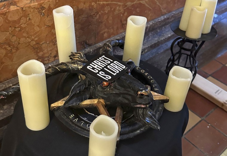 A damaged Satanic display at the Iowa state Capitol on Friday, Dec. 15, 2023.