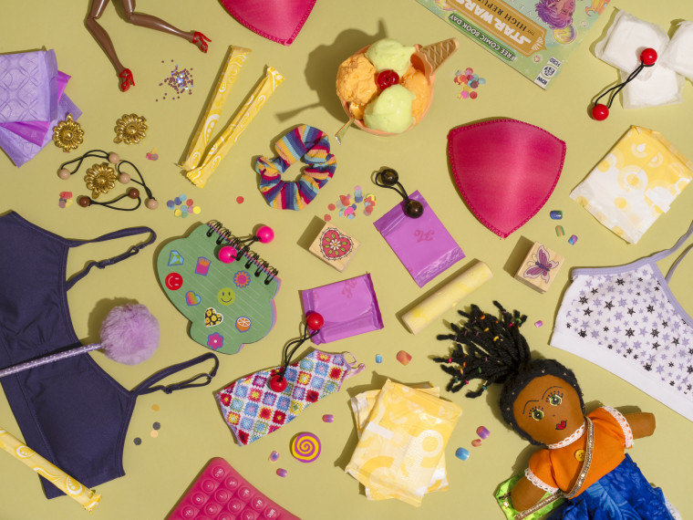 Photo illustration of various childhood, girlhood and puberty items including hair bobbles, scrunchies, a doll etc.