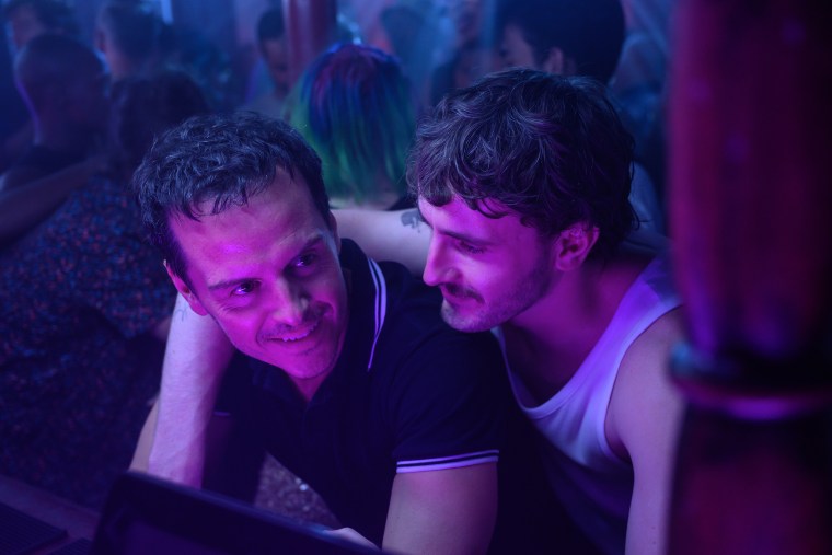 Andrew Scott and Paul Mescal smile in a scene from "All of Us Strangers." 