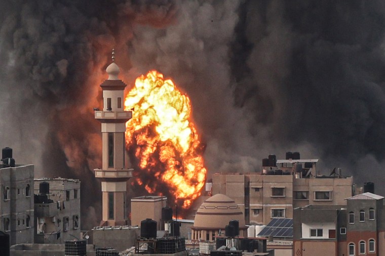 A fireball erupts after an Israeli strike over Rafah in the southern Gaza Strip on Dec. 20, 2023.