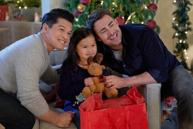 Vincent Rodriguez, Jonathan Bennett, and Milana Wan in "Christmas on Cherry Lane" on Hallmark Channel.