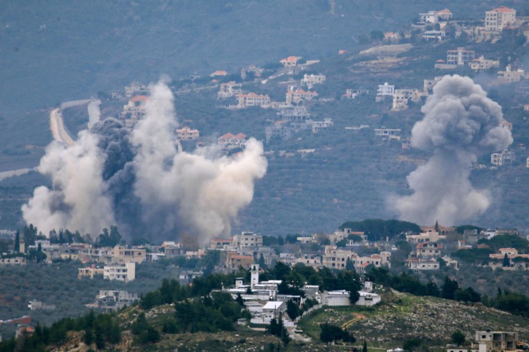 Smoke billows after Israeli bombardment Kfar Kila, Lebanon, near the border with Israel on Dec. 21, 2023.