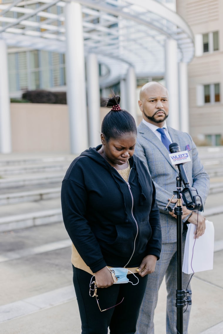 Sherita Harris and Attorney Carlos Moore at a news conference Federal Court building in Jackson, Miss.