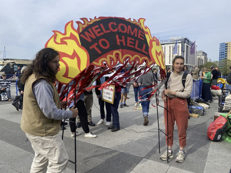 Protesters, including Christian Climate Action, gather outside Shell's annual general meeting in London on May 23, 2023.  