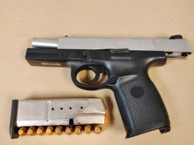 The .40 caliber semi automatic handgun recovered at the scene.
