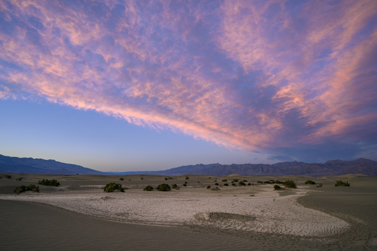 Playa and sunset clouds at Mesquite Flat Sand Dunes