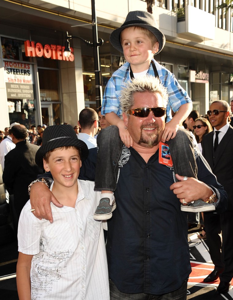 Guy Fieri and sons Ryder Fieri and Hunter Fieri attend the premiere of Disney/Pixar's "Cars 2" at the El Capitan Theatre on June 18, 2011 in Hollywood, California.
