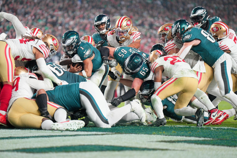 Philadelphia Eagles quarterback Jalen Hurts scores on "tush push" against the San Francisco 49ers on Dec. 3, 2023.