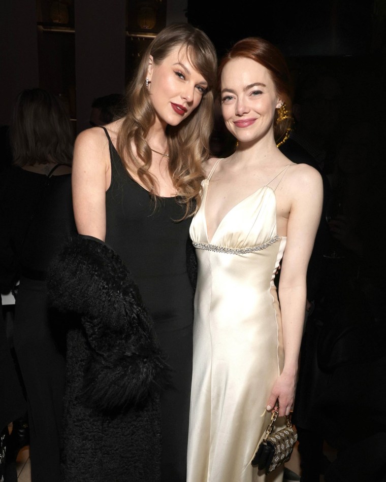 Taylor Swift and Emma Stone at the Poor Things film premiere.