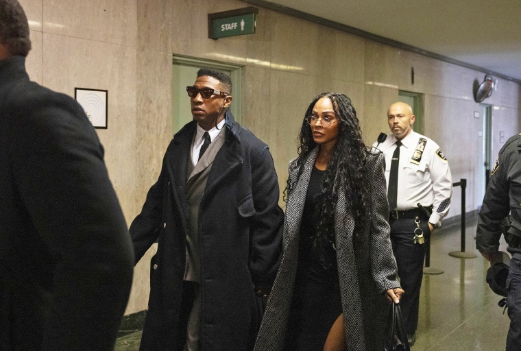 Jonathan Majors and Meagan Good arrive at court for a jury selection