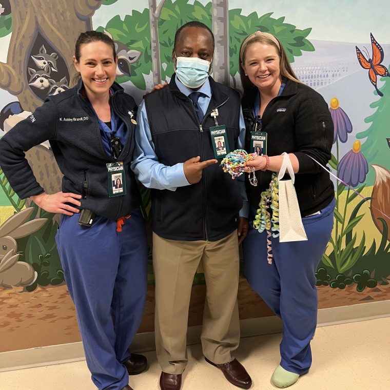 The Reading Hospital staff posed with the friendship bracelets before handing them out to patients.
