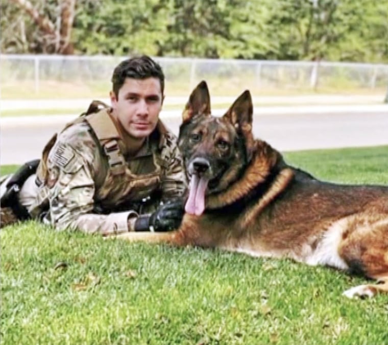 Sergeant with his military K-9 dog 