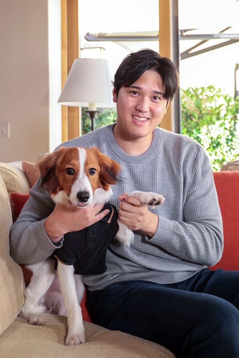 Shohei Ohtani with his dog before he was named 2023 AL MVP.