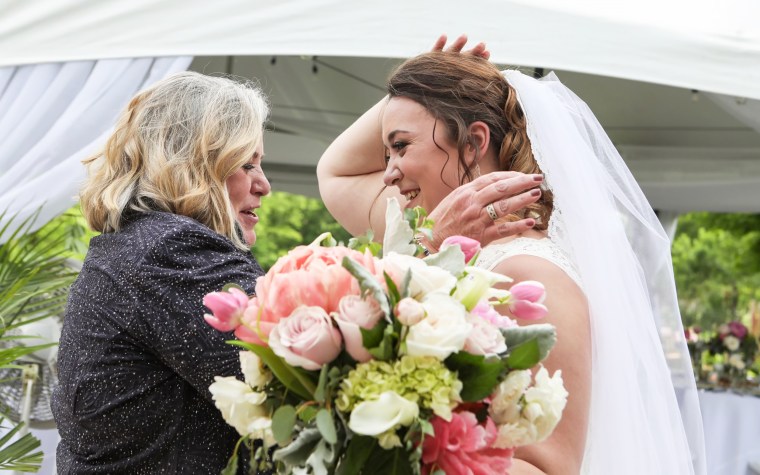 McKenna planned her dress around her mother's veil "so I knew if I was going to get married, I needed to do it while I could still wear my mom’s veil," before her hair started falling out from chemotherapy, she says.