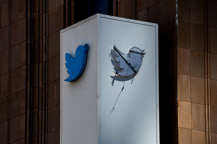 Image: A partially removed sign at Twitter headquarters