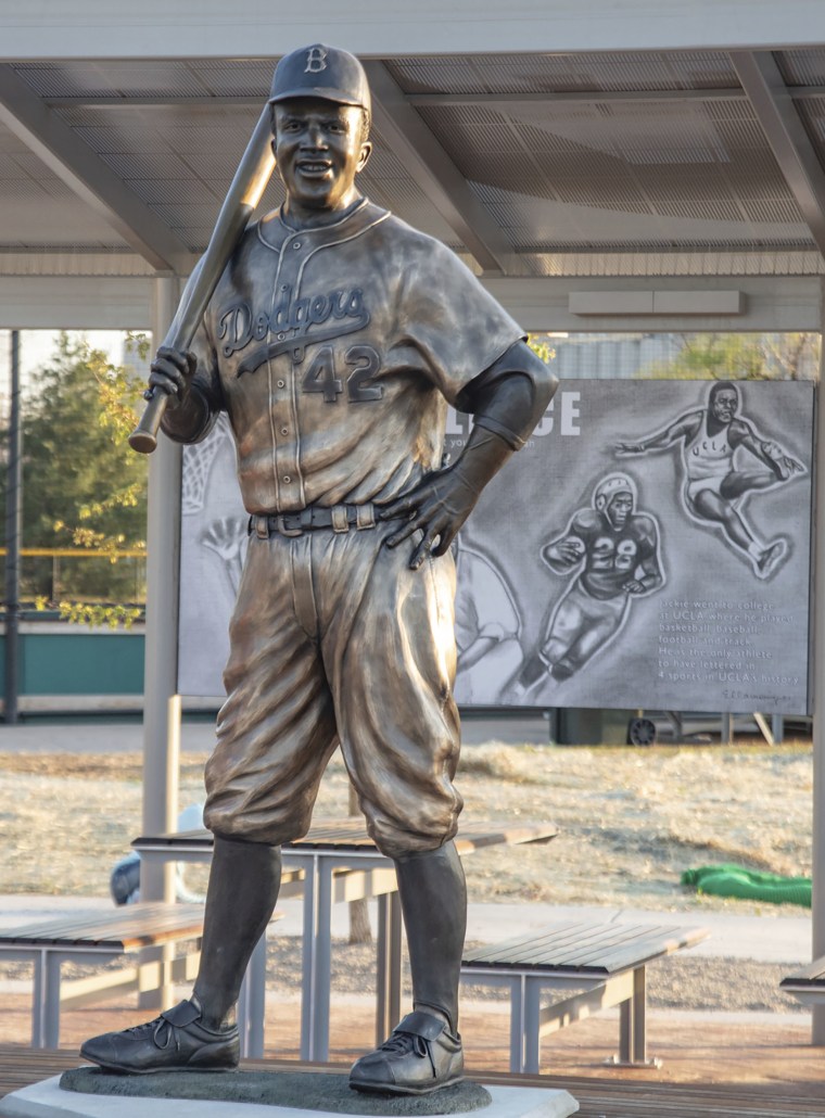 The statue of Jackie Robinson in Wichita, Kan., before it was cut down.