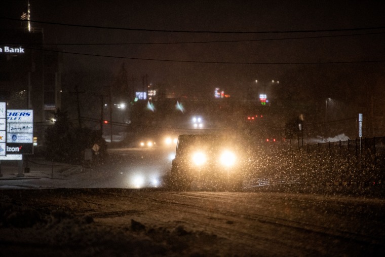Cars and trucks make their way on US route  in Saugus, Massachusetts on Jan. 7, 2024. 