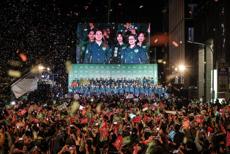 Confetti flies over the stage and crowd as Taiwan's Vice President and presidential-elect from the Democratic Progressive Party Lai Ching-te and his running mate Hsiao Bi-khim speak to supporters on Jan. 13, 2024 in Taipei, Taiwan. 