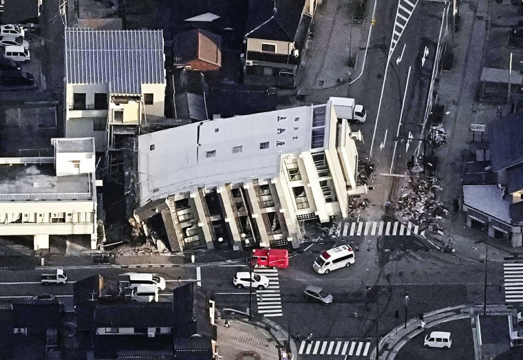 A toppled building in Wajima, Ishikawa prefecture, Japan Tuesday, Jan. 2, 2024.