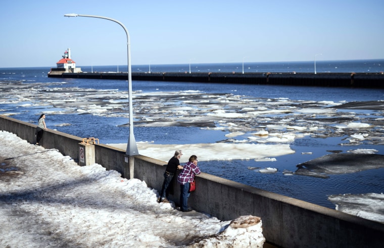 Ice partially covers a harbor in Lake Superior