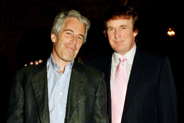 Jeffrey Epstein and Donald Trump  smile for a photo at Mar-a-Lago