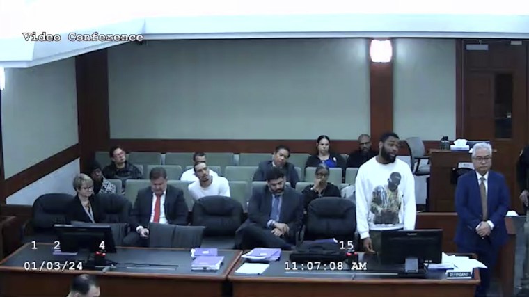 Deobra Delone Redden in a white long-sleeve shirt at his sentencing in Las Vegas on Jan. 3. 