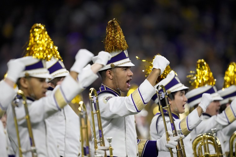 The Washington band performs before the national championship NCAA College Football Playoff game tonight.