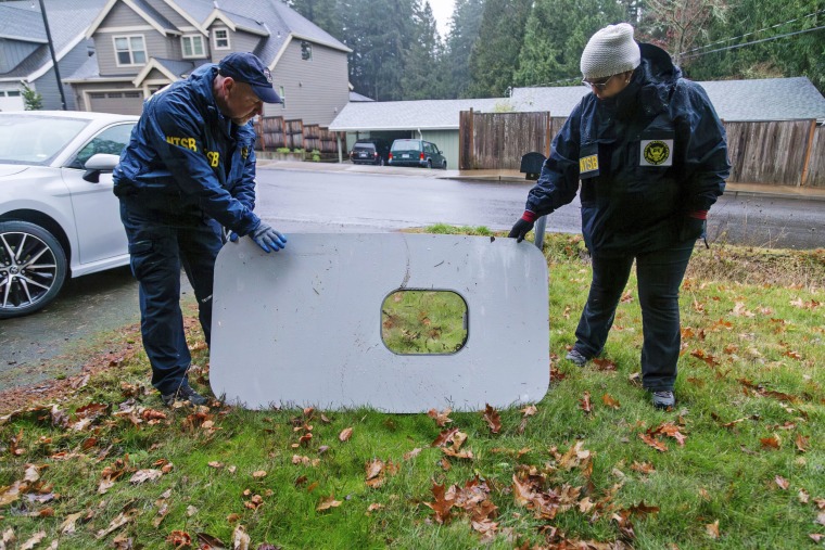 The door plug from Alaska Airlines Flight 1282 on is recovered on Jan. 8, 2024, in Portland, Ore.