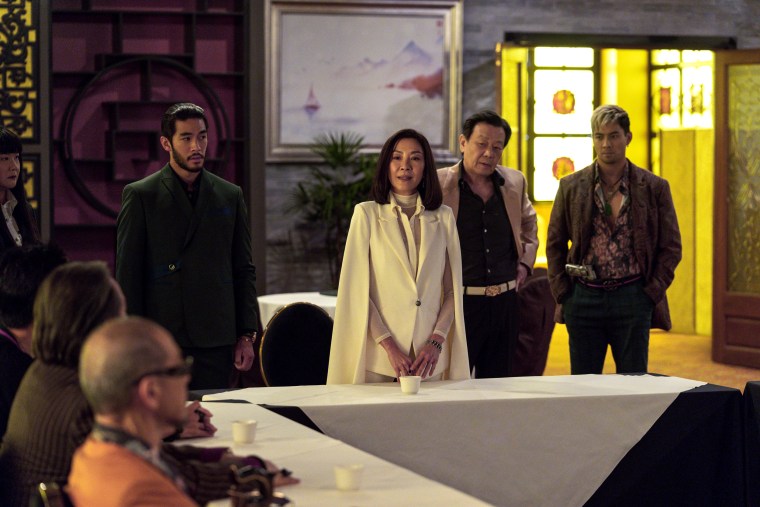 Justin Chien, Michelle Yeoh,  Johnny Kou, and Yoshi Sudarso  in 'The Brothers Sun'. 