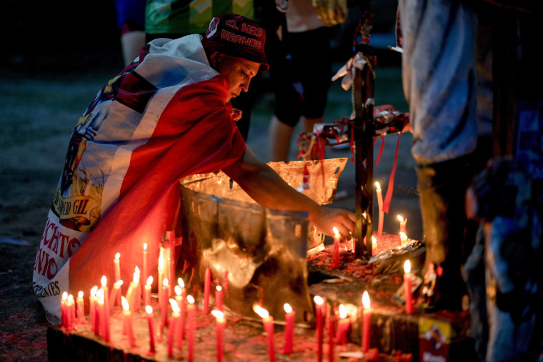 Juan Morel lights a candle at the sanctuary of Argentina's folk Saint "Gauchito" Gil to commemorate his Jan. 8 death in Mercedes Corrientes, Argentina, on Jan. 6, 2024. 