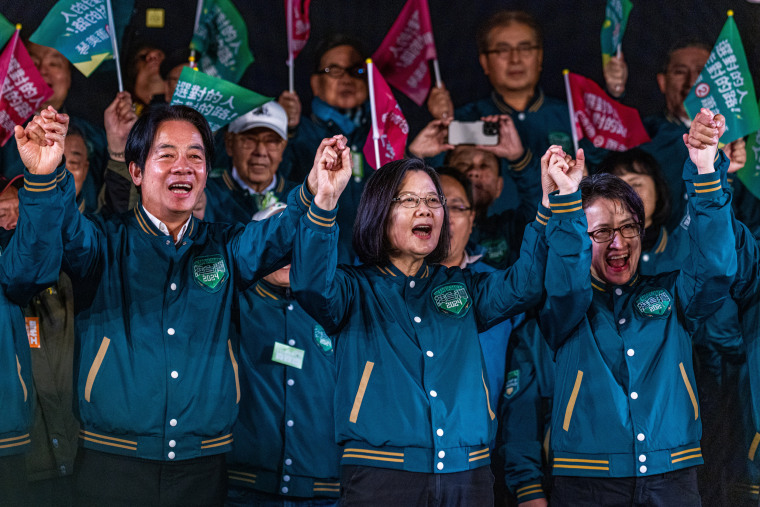 Democratic Progressive Party  presidential candidate Lai Ching-te, his running mate Hisao Bi-khim and Taiwan's President Tsai Ing-wen, center, at a rally on Jan. 11, 2024 in Taipei.