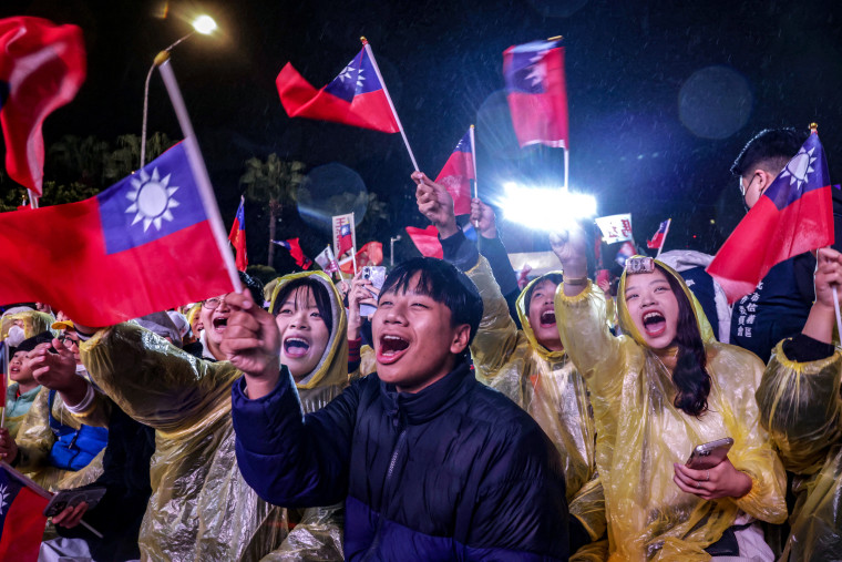 Supporters attend a Kuomintang campaign rally ahead of Taiwan's presidential election in Taipe