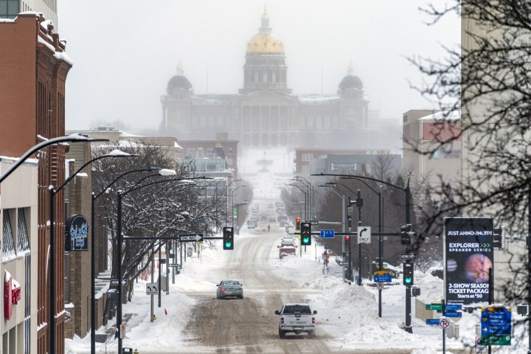 The Iowa State Capitol Building is seen in the distance in Des Moines, Iowa, on Saturday. 