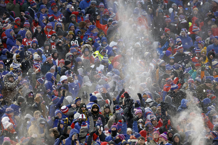 Buffalo Bills fans celebrate a touchdown by throwing snow during the first quarter against the Pittsburgh Steelers at Highmark Stadium on January 15, 2024 in Orchard Park, New York. 