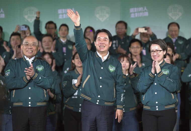 Taiwanese Vice President Lai Ching-te, also known as William Lai, center, celebrates his victory with running mate Bi-khim Hsiao, right, and supporters in Taipei, Taiwan on Jan. 13, 2024. 