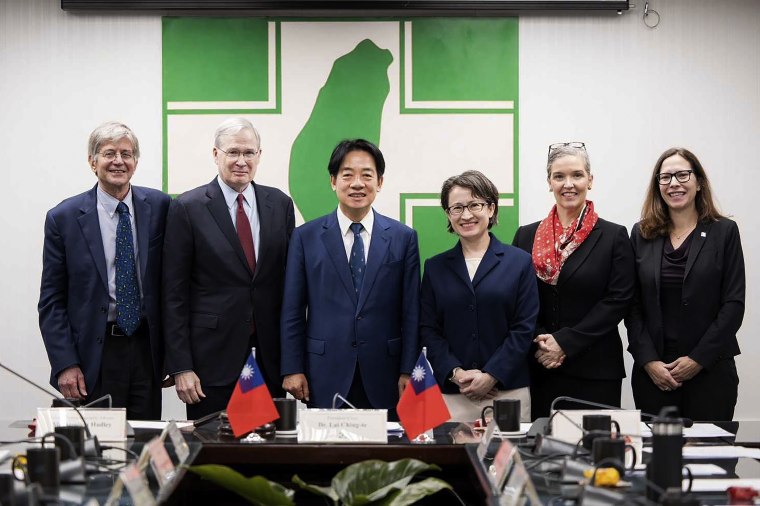  Retired U.S. officials have met with Taiwan's President Tsai Ing-wen and praised the island's democratic process that produced a new president-elect and legislature over the weekend in defiance of China's claim of sovereignty over Taiwan and threat to annex it by military force. (Democratic Progressive Party via AP)