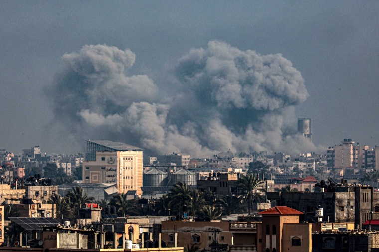 Smoke billows over Khan Younis in the southern Gaza Strip during Israeli bombardment on January 17, 2024.