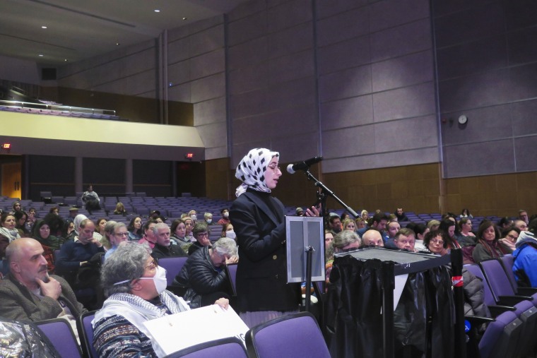 Tasneem Madani speaks in favor of a resolution calling for a ceasefire in the Israel-Hamas war on Jan. 17, 2024, at Pioneer High School in Ann Arbor, Mich. 