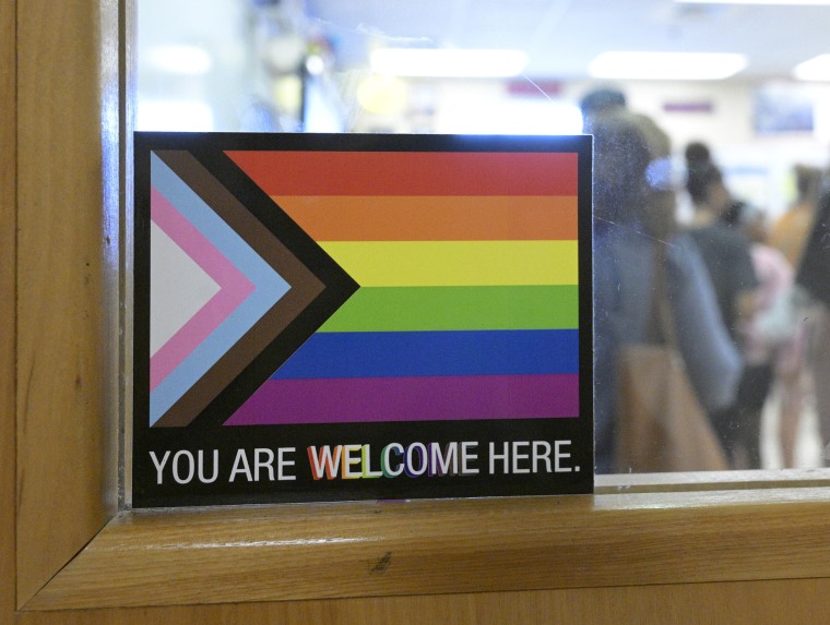 A sticker with an LGBTQ Pride flag is outside of a classroom door at a high school in Orlando, Fla