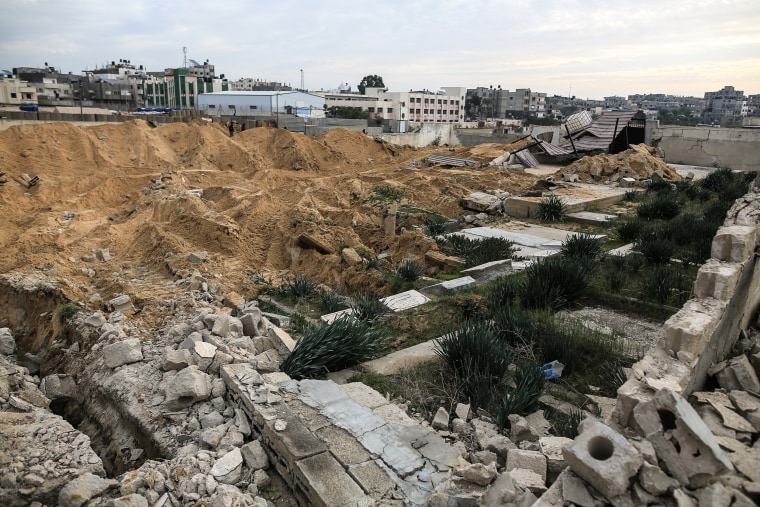 A damaged cemetery following the Israeli attacks near the Nasser Hospital in Khan Yunis, Gaza