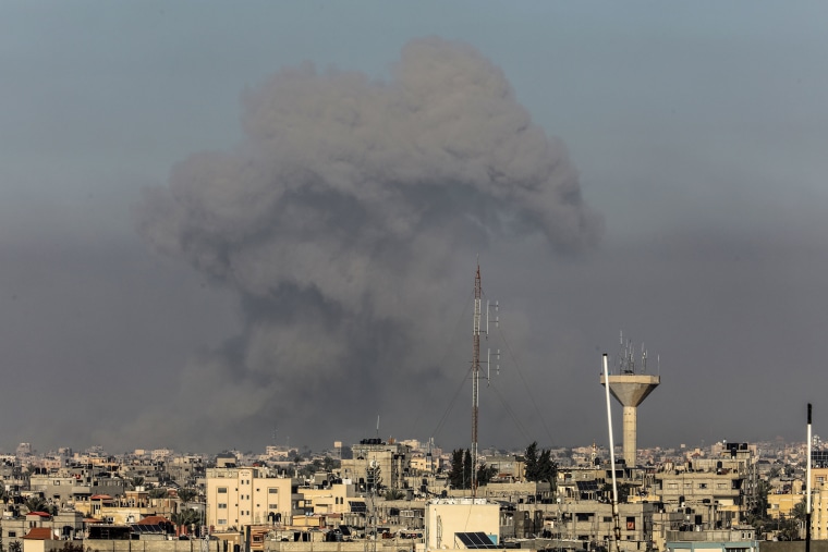 On January 19, 2024, smoke rises over residential areas after Israeli attacks on Gaza's Khan Yunis. 