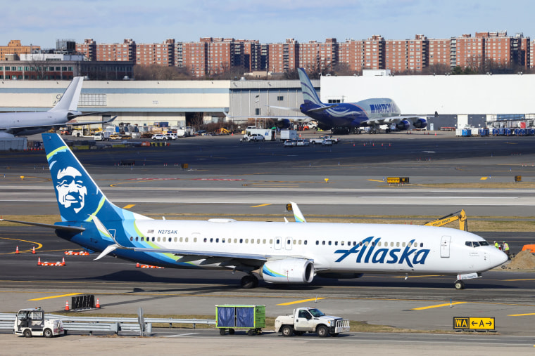 A Boeing 737-900er passengers aircraft of Alaska Airlines on its way to San Francisco is seen before take-off at John F. Kennedy Airport on Jan. 8, 2024.