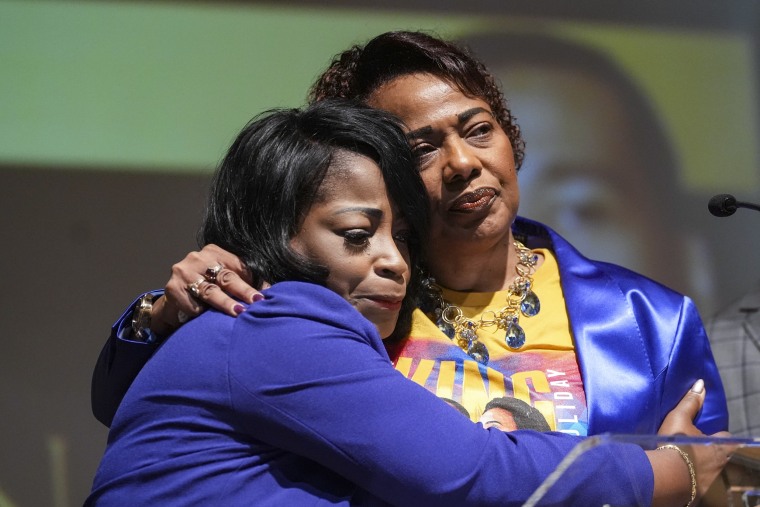 Image: Bernice King is embraced by her cousin Angela Farris Watkins