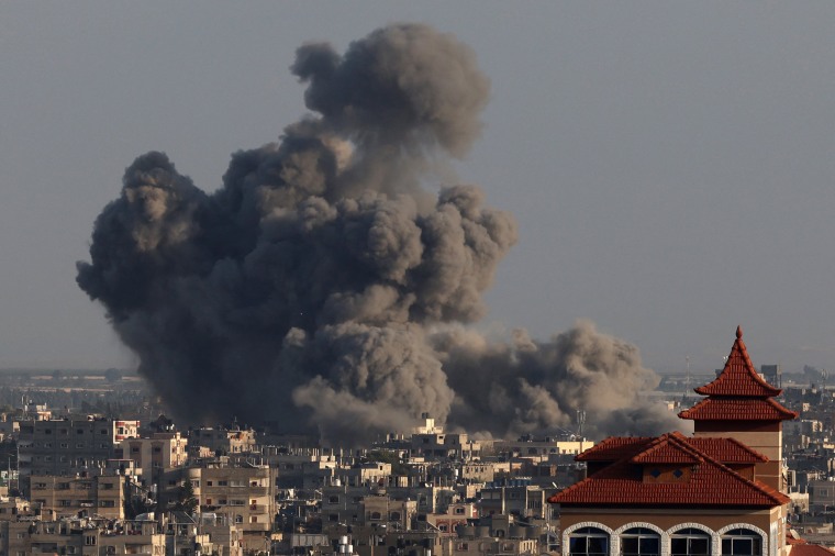 Smoke billows over Khan Younis in the southern Gaza Strip during Israeli bombardment on Jan. 24, 2024.