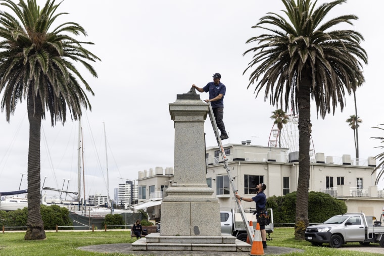 Two monuments symbolizing Australia's colonial past were damaged by protesters on Thursday ahead of an increasingly polarizing national holiday that marks the anniversary of British settlement. 