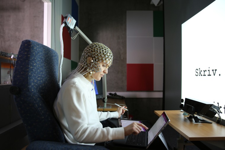 Study participant wearing a device on head.