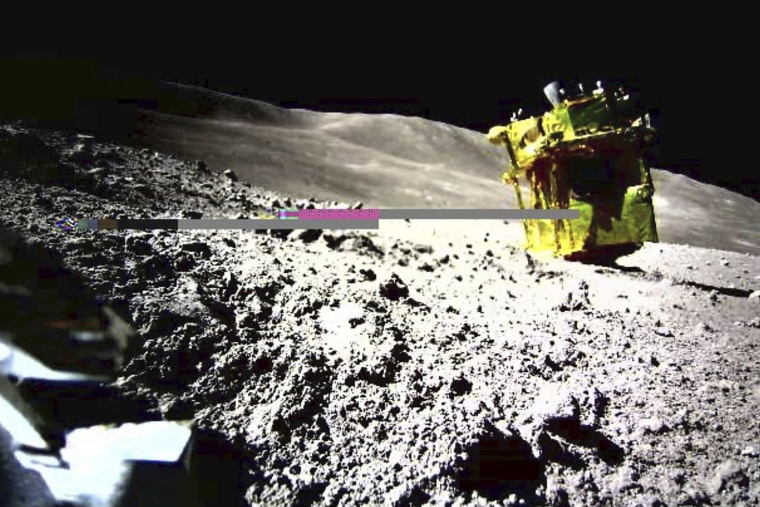 An image taken by a Lunar Excursion Vehicle 2 (LEV-2) of a robotic moon rover called Smart Lander for Investigating Moon, or SLIM, on the moon. 