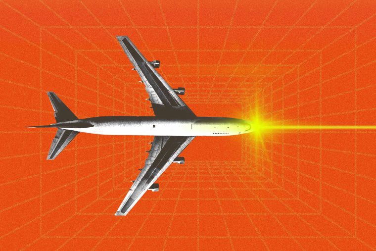 Photo illustration of a laser beam hitting a plane 